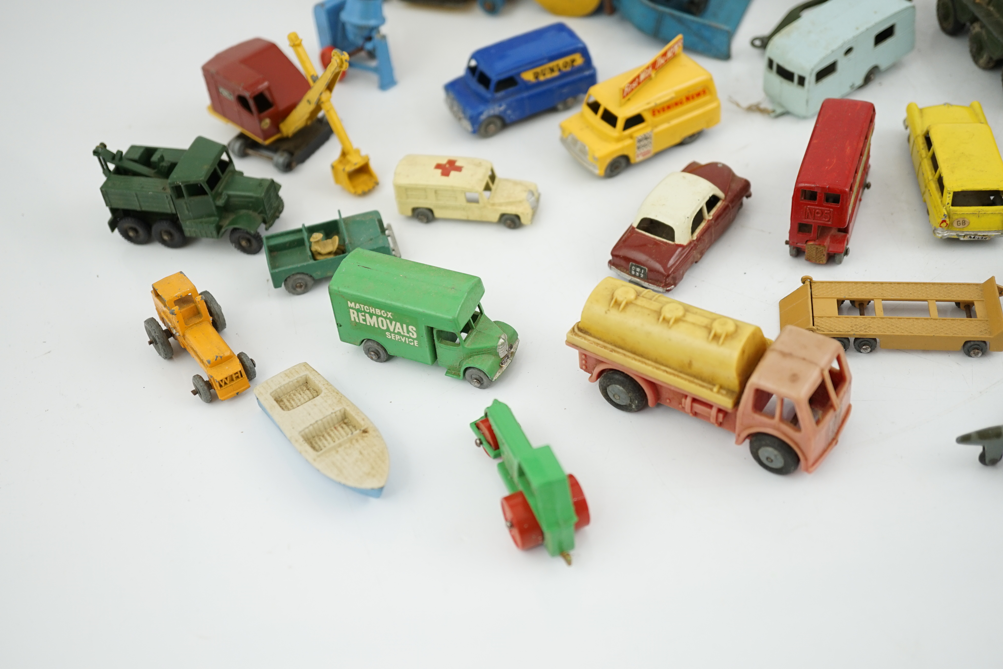 Thirty-eight diecast vehicles by Dinky Toys, Corgi Toys, Matchbox, etc. including a Spot-On BMW Isetta, military Dinky vehicles, Matchbox Series, etc.